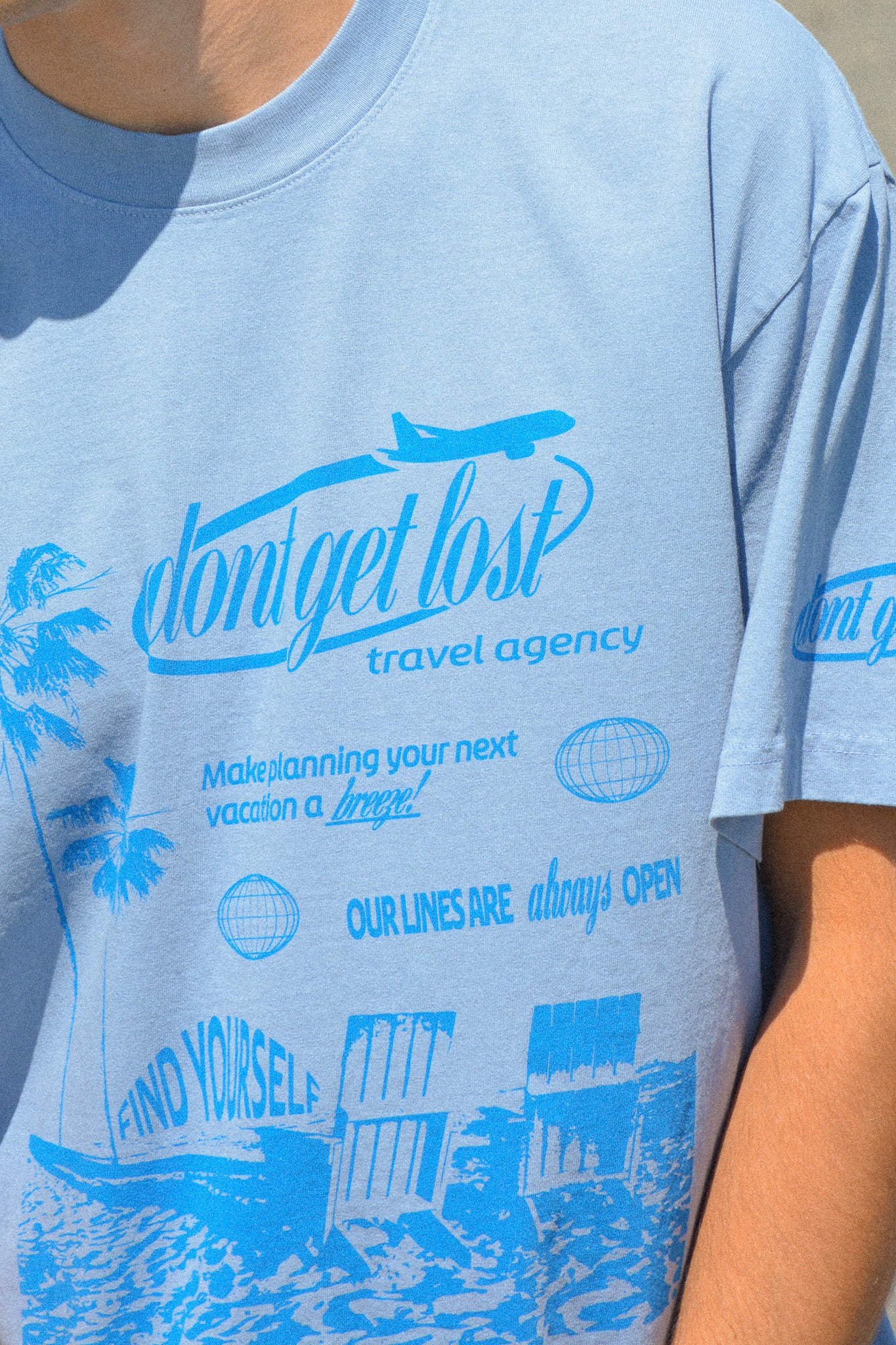 Don't Get Lost Travel Agency Tee